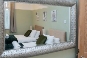 Stylish double bedroom Biddulph house mirror
