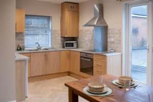 Full kitchen with oven and microwave Biddulph house